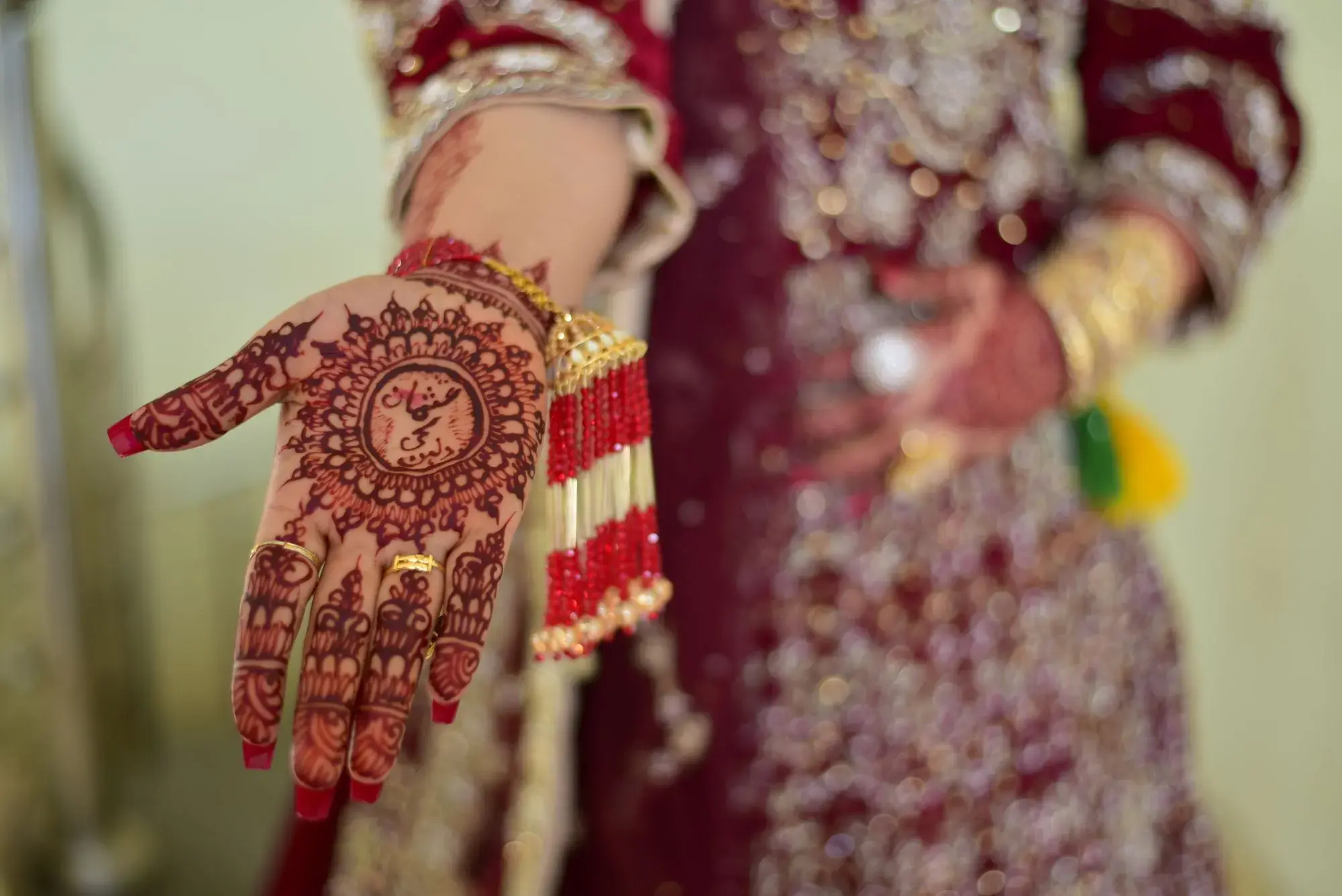 A hand with fine bridal mehendi
